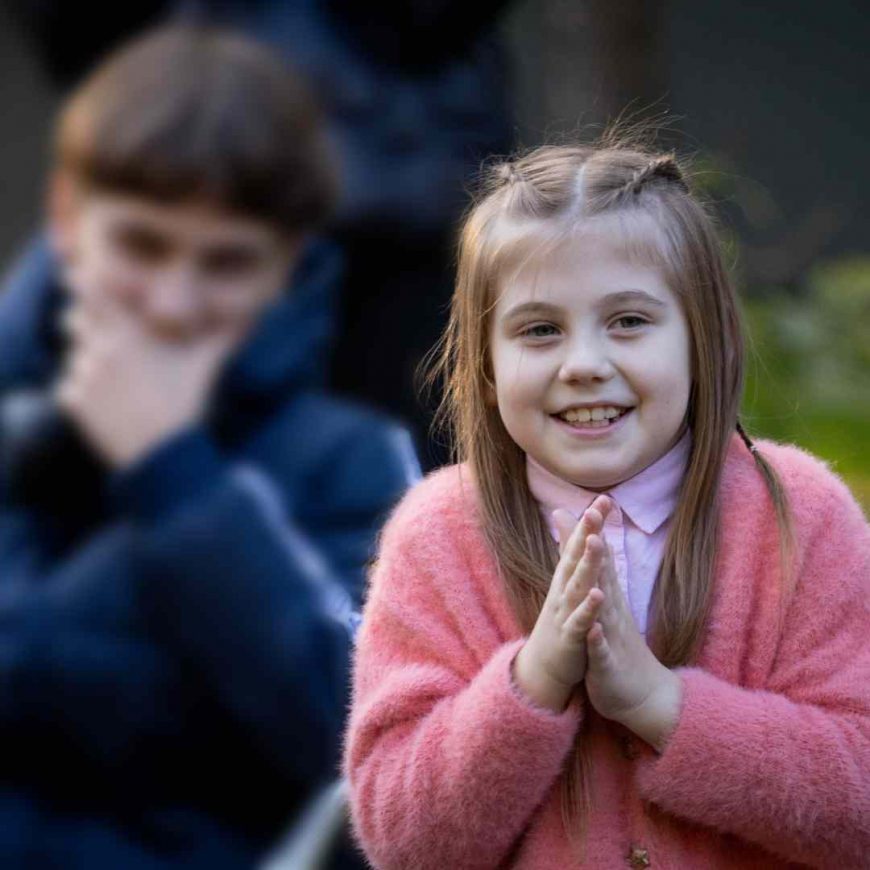 Girl smiling and clapping