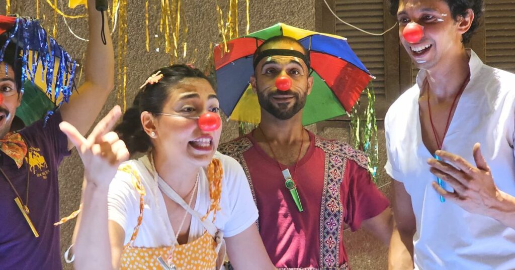 Colorful clowns perform for refugees in Egypt.