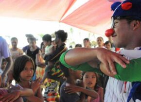 Clown posing with kids