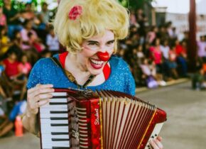 clown with accordion at a clown show