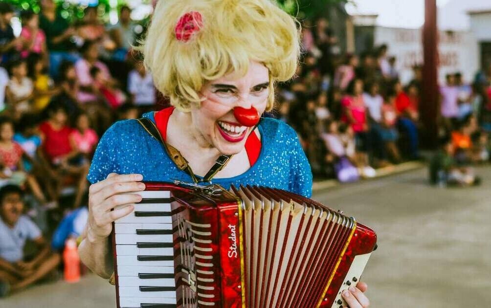 clown with accordion at a clown show