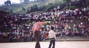 clown and child with hula hoop