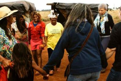 Group holding hands and forming a circle