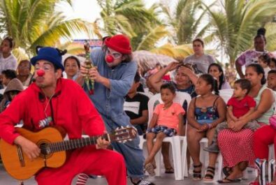 Group watching a clown performance