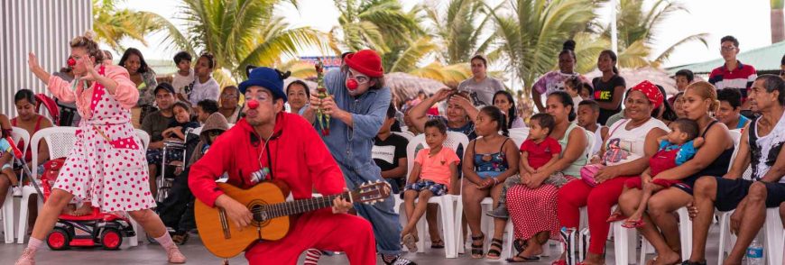 Group watching a clown performance