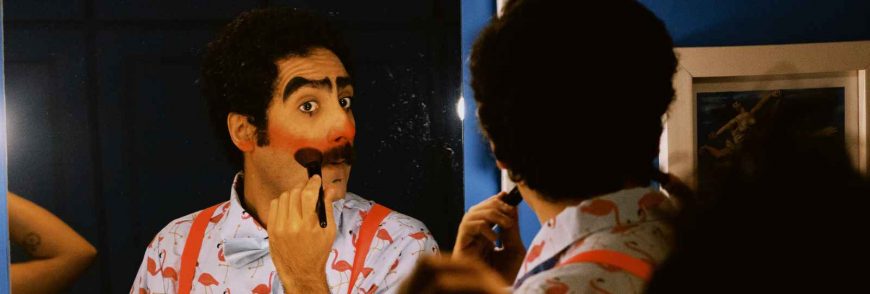 Clown applying makeup