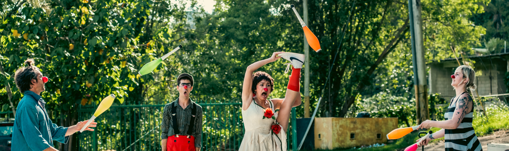 Clowns juggling and stretching