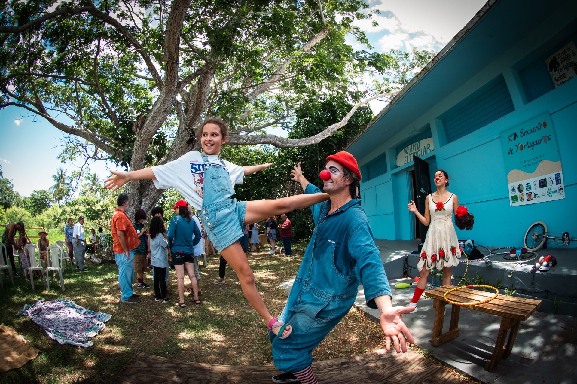 Clown and kid posing