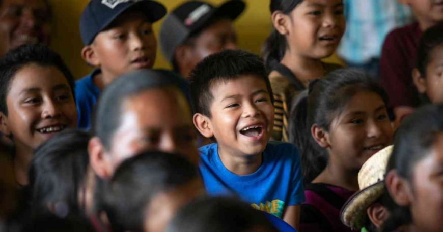 Group of kids looking happy and amused