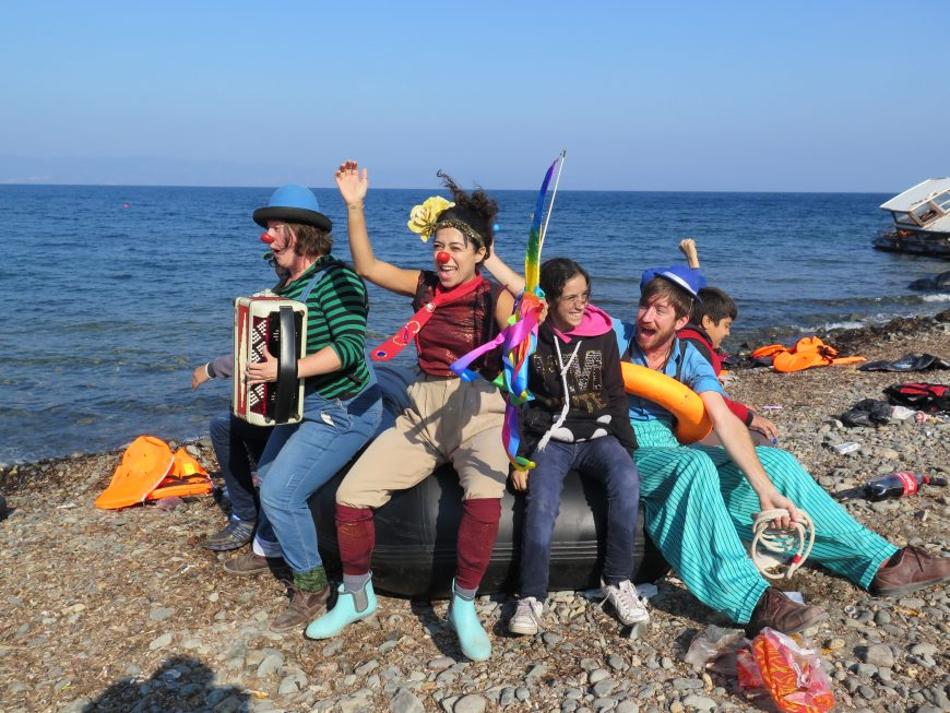 Group sitting on innertube at a beach