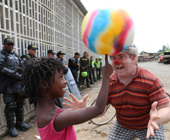 Kid balancing ball