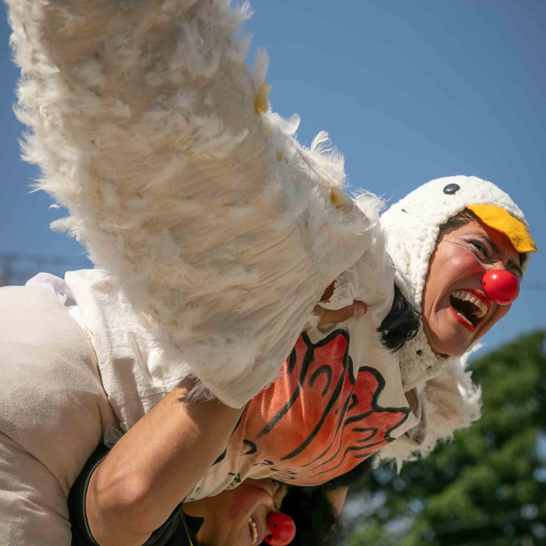 Clown in chicken suit