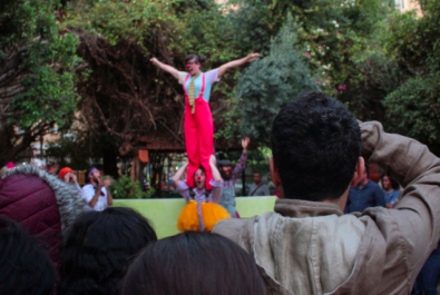 Clown balancing on another clown